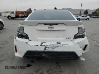 2014 Scion tC z VIN JTKJF5C7XE3079538, wystawiony jako Copart lot #85018414 z przebiegiem 136 905 mil mil oraz Czysty tytuł • Clean title. Historia ofert i sprzedaży dostępna na DreamBid. Obrazek 6.