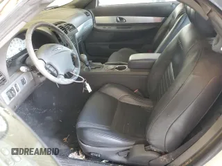 2002 Ford Thunderbird Hardtop Premium z VIN 1FAHP60A52Y130277, wystawiony jako Copart lot #69473594 z przebiegiem Nie podano mil oraz Szkoda całkowita • Salvage title. Historia ofert i sprzedaży dostępna na DreamBid. Obrazek 7.