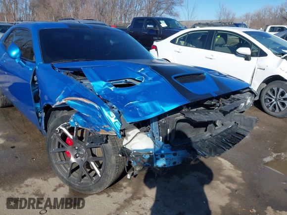 2019 Dodge Challenger R/T Scat Pack Widebody z VIN 2C3CDZFJ0KH552252, wystawiony jako IAAI lot #41662399 z przebiegiem 63 337 mil mil oraz . Historia ofert i sprzedaży dostępna na DreamBid. Obrazek 6.