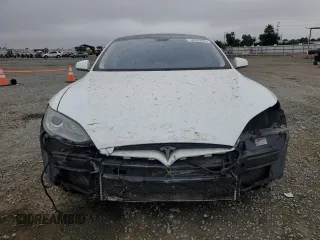 2014 Tesla Model S 60 с VIN 5YJSA1H19EFP52457, выставлен на аукционе Copart как лот 59589905 с пробегом 167 662 миль миль и Списание • Salvage title. История ставок и продаж доступна на DreamBid. Изображение 5.