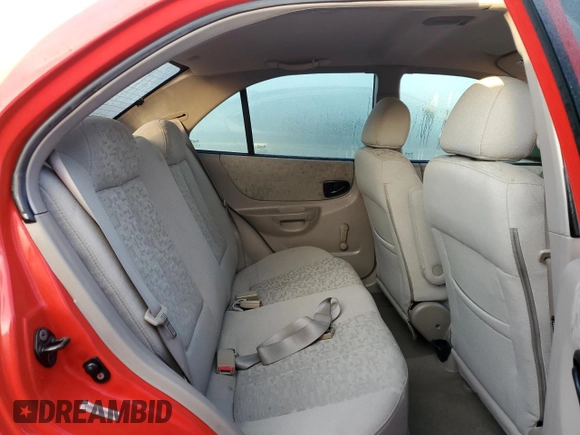 2005 Hyundai Accent GLS with VIN KMHCG45C15U596671, listed as a Copart auction lot 74834004 with 0 mi miles and Salvage Title. Bid and sale history available at carsss.com. Image 10.