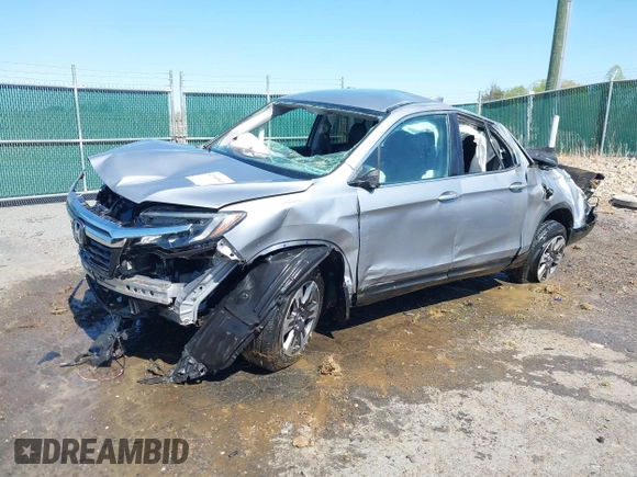2017 Honda Ridgeline RTL with VIN 5FPYK3F53HB007790, listed as a IAAI auction lot 42060848 with 84,494 mi miles and . Bid and sale history available at DreamBid. Image 2.