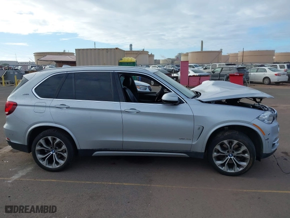 2018 BMW X5 xDrive40e iPerformance with VIN 5UXKT0C59J0W01768, listed as a IAAI auction lot 41603257 with 1 mi miles. Bid and sale history available at carsss.com. Image 14.
