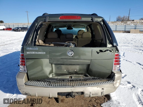 2004 Mercury Mountaineer Convenience z VIN 4M2ZU86K04ZJ43478, wystawiony jako Copart lot #42244735 z przebiegiem 190 892 mil mil oraz Szkoda całkowita • Salvage title. Historia ofert i sprzedaży dostępna na DreamBid. Obrazek 6.