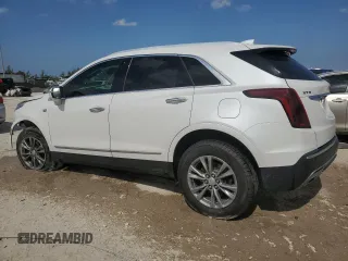 2021 Cadillac XT5 FWD Premium Luxury z VIN 1GYKNCRS7MZ115531, wystawiony jako Copart lot #53611095 z przebiegiem 34 931 mil mil oraz Szkoda całkowita • Salvage title. Historia ofert i sprzedaży dostępna na DreamBid. Obrazek 2.