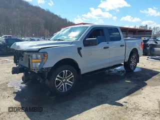 2023 Ford F-150 XL with VIN 1FTFW1E51PFB15197, listed as a IAAI auction lot 41869063 with 33,980 mi miles and . Bid and sale history available at DreamBid. Image 19.