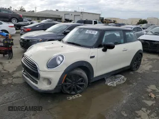 2020 MINI Hardtop Cooper with VIN WMWXR3C03L2M73723, listed as a Copart auction lot 45218215 with 67,807 mi miles and Salvage title. Bid and sale history available at DreamBid. Image 1.