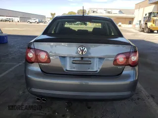 2010 Volkswagen Jetta S with VIN 3VWJZ7AJ9AM052569, listed as a Copart auction lot 59016965 with 166,950 mi miles and Salvage title. Bid and sale history available at DreamBid. Image 6.