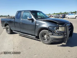 1999 Ford F-150 with VIN 1FTZX1726XKB49687, listed as a Copart auction lot 56416455 with 240,196 mi miles and Salvage title. Bid and sale history available at DreamBid. Image 4.
