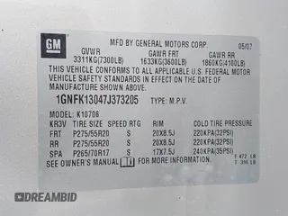 2007 Chevrolet Tahoe LTZ with VIN 1GNFK13047J373205, listed as a IAAI auction lot 41830747 with 182,361 mi miles and . Bid and sale history available at DreamBid. Image 9.