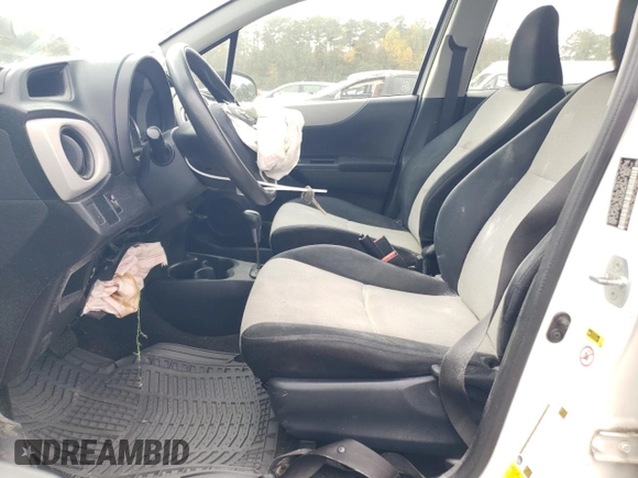 2012 Toyota Yaris L with VIN JTDKTUD30CD528470, listed as a Copart auction lot 79952414 with 157,062 mi miles and Salvage Title. Bid and sale history available at DreamBid. Image 7.