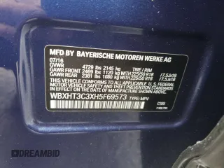 2017 BMW X1 xDrive28i with VIN WBXHT3C3XH5F69573, listed as a Copart auction lot 52719715 with 93,981 mi miles and Salvage Title. Bid and sale history available at DreamBid. Image 13.