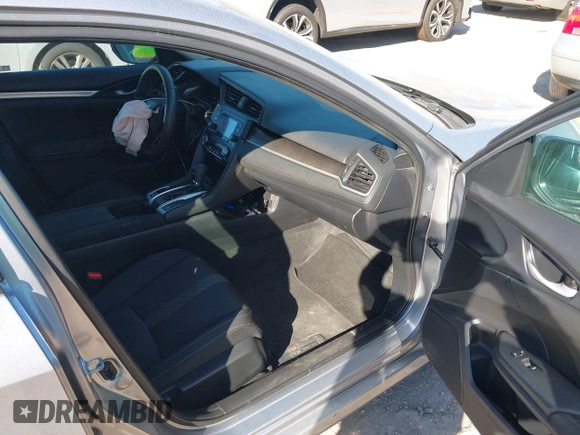 2020 Honda Civic LX with VIN 19XFC2F62LE009433, listed as a IAAI auction lot 40963670 with 117,865 mi miles and . Bid and sale history available at DreamBid. Image 5.