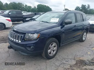 2016 Jeep Compass Sport with VIN 1C4NJCBB5GD761063, listed as a IAAI auction lot 42395903 with 122,102 mi miles and . Bid and sale history available at DreamBid. Image 2.