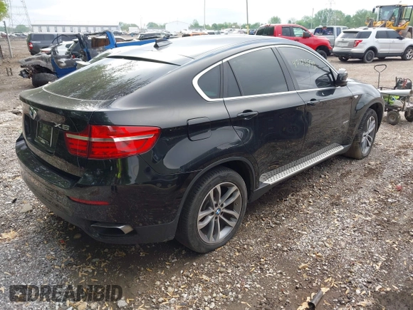 2013 BMW X6 xDrive50i z VIN 5UXFG8C56DL591241, wystawiony jako IAAI lot #42176792 z przebiegiem 142 973 mil mil oraz . Historia ofert i sprzedaży dostępna na DreamBid. Obrazek 4.