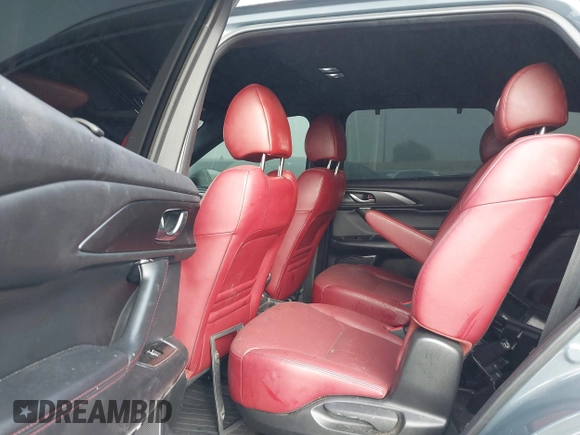 2021 Mazda CX-9 Grand Touring with VIN JM3TCADY1M0519288, listed as a IAAI auction lot 41186094 with 50,701 mi miles and . Bid and sale history available at DreamBid. Image 8.