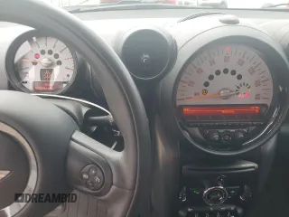 2014 MINI Countryman S z VIN WMWZC3C57EWP51864, wystawiony jako Copart lot #71233944 z przebiegiem 73 828 mil mil oraz Szkoda całkowita • Salvage title. Historia ofert i sprzedaży dostępna na DreamBid. Obrazek 9.
