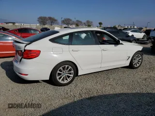 2014 BMW 3 Series 328i Gran Turismo xDrive with VIN WBA3X5C57ED242679, listed as a Copart auction lot 48598665 with 69,712 mi miles and Salvage title. Bid and sale history available at DreamBid. Image 3.