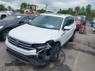 2023 Volkswagen Tiguan SE with VIN 3VVMB7AX0PM036876, listed as a IAAI auction lot 42023415 with 42,003 mi miles and . Bid and sale history available at DreamBid. Image 2.
