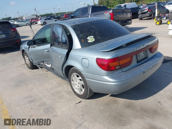 2002 Saturn SL z VIN 1G8ZK54702Z130021, wystawiony jako IAAI lot #42091064 z przebiegiem 68 754 mil mil oraz . Historia ofert i sprzedaży dostępna na DreamBid. Obrazek 3.