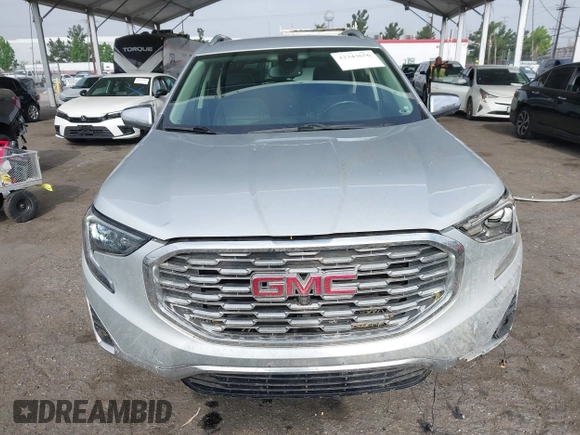 2020 GMC Terrain Denali z VIN 3GKALXEX0LL294117, wystawiony jako IAAI lot #42343656 z przebiegiem 67 697 mil mil oraz . Historia ofert i sprzedaży dostępna na DreamBid. Obrazek 6.