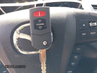 2012 Mazda 3 i Grand Touring с VIN JM1BL1M82C1635757, выставлен на аукционе IAAI как лот 42482177 с пробегом 405 358 миль миль и . История ставок и продаж доступна на DreamBid. Изображение 11.