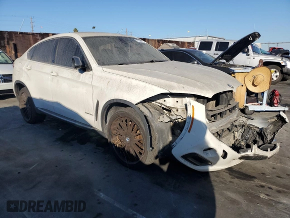 2016 BMW X6 sDrive35i with VIN 5UXKU0C56G0F92990, listed as a Copart auction lot 77191074 with 194,077 mi miles and Salvage Title. Bid and sale history available at carsss.com. Image 4.
