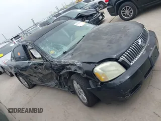 2007 Mercury Montego z VIN 1MEHM401X7G610172, wystawiony jako IAAI lot #41933589 z przebiegiem Nie podano mil oraz . Historia ofert i sprzedaży dostępna na DreamBid. Obrazek 13.