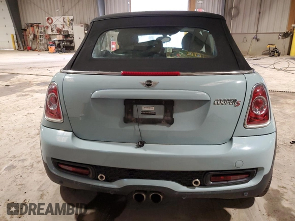 2014 MINI Convertible S с VIN WMWZP3C59ET707581, выставлен на аукционе Copart как лот 46983865 с пробегом 42 746 миль миль и Списание • Salvage title. История ставок и продаж доступна на DreamBid. Изображение 6.