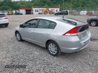 2010 Honda Insight LX with VIN JHMZE2H57AS008203, listed as a IAAI auction lot 42240869 with 150,562 mi miles and . Bid and sale history available at DreamBid. Image 3.