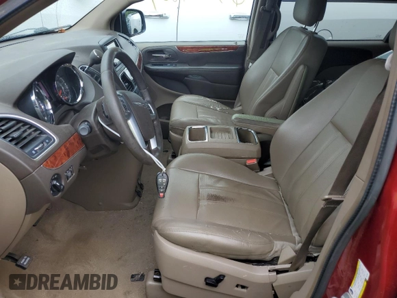 2012 Chrysler Town & Country Touring with VIN 2C4RC1BG9CR412507, listed as a Copart auction lot 63881804 with 144,557 mi miles and Salvage Title. Bid and sale history available at DreamBid. Image 7.