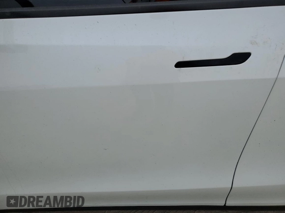 2021 Tesla Model Y Standard Range z VIN 5YJYGDED1MF109091, wystawiony jako Copart lot #50414004 z przebiegiem Nie podano mil oraz Szkody całkowita. Historia ofert i sprzedaży dostępna na DreamBid. Obrazek 7.
