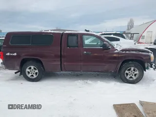 2005 Dodge Dakota SLT with VIN 1D7HW42N65S305733, listed as a IAAI auction lot 41289814 with 149,226 mi miles and . Bid and sale history available at DreamBid. Image 14.