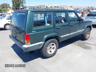 1999 Jeep Cherokee Sport with VIN 1J4FF68S0XL640066, listed as a IAAI auction lot 42768166 with 196,290 mi miles and . Bid and sale history available at DreamBid. Image 4.
