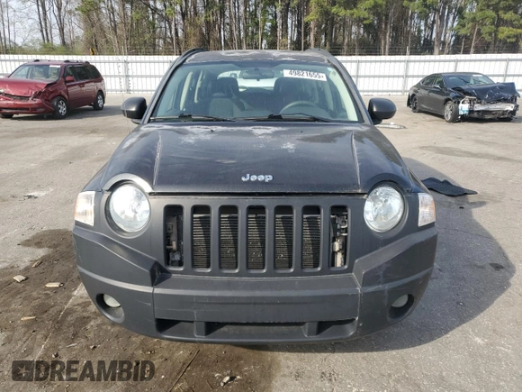 2009 Jeep Compass North with VIN 1J4FT47B09D238270, listed as a Copart auction lot 49821655 with 149,419 mi miles and Clean Title. Bid and sale history available at carsss.com. Image 5.