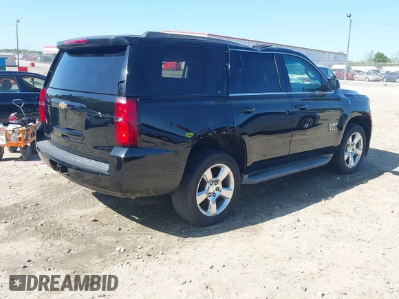 2015 Chevrolet Tahoe LT with VIN 1GNSCBKC8FR268891, listed as a IAAI auction lot 41964602 with 175,035 mi miles and . Bid and sale history available at DreamBid. Image 4.