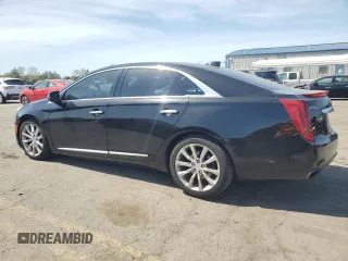 2016 Cadillac XTS Luxury Collection with VIN 2G61N5S37G9110587, listed as a Copart auction lot 55276535 with 140,550 mi miles and Salvage title. Bid and sale history available at DreamBid. Image 2.