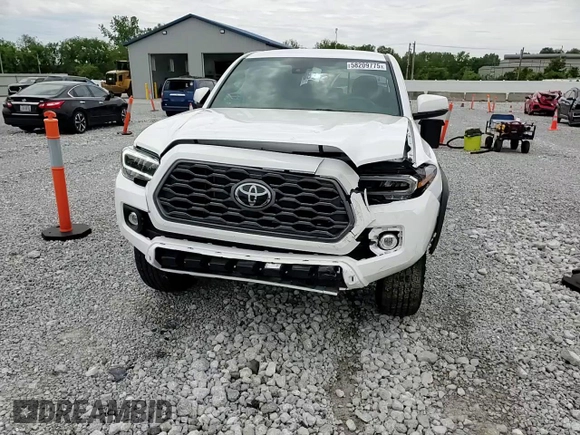 2023 Toyota Tacoma SR z VIN 3TMCZ5AN2PM583382, wystawiony jako Copart lot #58209775 z przebiegiem 17 442 mil mil oraz Szkoda całkowita • Salvage title. Historia ofert i sprzedaży dostępna na DreamBid. Obrazek 13.