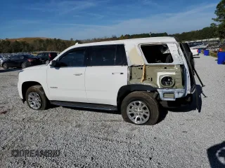 2020 GMC Yukon SLT with VIN 1GKS1BKC2LR248912, listed as a Copart auction lot 79935584 with 100,313 mi miles and Salvage Title. Bid and sale history available at DreamBid. Image 2.