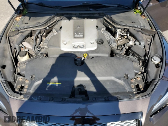 2015 Infiniti Q50 with VIN JN1BV7AR9FM405679, listed as a Copart auction lot 55884795 with 104,419 mi miles and Salvage title. Bid and sale history available at DreamBid. Image 11.