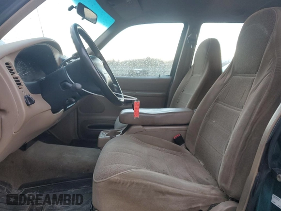 1998 Ford Explorer XL z VIN 1FMZU34X8WZB89467, wystawiony jako Copart lot #49973325 z przebiegiem 168 026 mil mil oraz Czysty tytuł • Clean title. Historia ofert i sprzedaży dostępna na DreamBid. Obrazek 7.