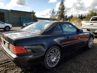 1997 Mercedes-Benz SL-Class with VIN WDBFA63F7VF145758, listed as a Copart auction lot 77503244 with 132,664 mi miles and Clean Title. Bid and sale history available at carsss.com. Image 3.