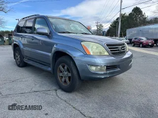 2004 Lexus GX 470 with VIN JTJBT20X040033026, listed as a Copart auction lot 51527405 with 164,108 mi miles and Clean Title. Bid and sale history available at carsss.com. Image 1.