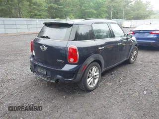 2011 MINI Countryman S z VIN WMWZC3C55BWL79422, wystawiony jako IAAI lot #42466982 z przebiegiem 104 392 mil mil oraz . Historia ofert i sprzedaży dostępna na DreamBid. Obrazek 4.