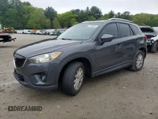 2014 Mazda CX-5 Touring z VIN JM3KE4CY6E0422436, wystawiony jako Copart lot #57196355 z przebiegiem 106 729 mil mil oraz Tytuł czysty. Historia ofert i sprzedaży dostępna na DreamBid. Obrazek 1.