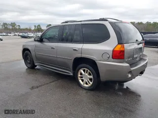 2006 GMC Envoy Denali with VIN 1GKET63M262240313, listed as a IAAI auction lot 41605984 with 199,896 mi miles. Bid and sale history available at carsss.com. Image 3.