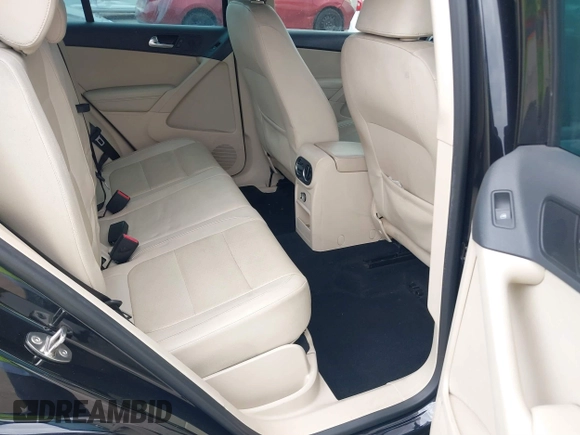 2014 Volkswagen Tiguan SE z VIN WVGAV3AXXEW535128, wystawiony jako IAAI lot #41882213 z przebiegiem 103 161 mil mil oraz . Historia ofert i sprzedaży dostępna na DreamBid. Obrazek 8.