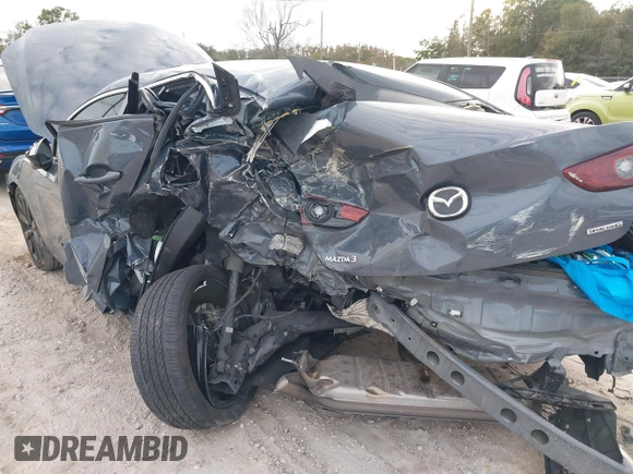 2022 Mazda 3 Carbon Edition z VIN JM1BPACL2N1509492, wystawiony jako IAAI lot #41198183 z przebiegiem Nie podano mil oraz . Historia ofert i sprzedaży dostępna na DreamBid. Obrazek 6.
