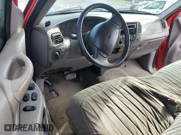 1998 Ford F-150 z VIN 1FTZX17W8WNC34501, wystawiony jako Copart lot #54675995 z przebiegiem 124 628 mil mil oraz Szkoda całkowita • Salvage title. Historia ofert i sprzedaży dostępna na DreamBid. Obrazek 8.