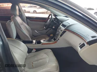 2011 Cadillac CTS Luxury with VIN 1G6DF5EY6B0104932, listed as a IAAI auction lot 42032457 with 165,833 mi miles and . Bid and sale history available at DreamBid. Image 5.
